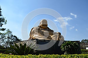 Statue in the buddhist temple of Iguassu Falls, Brazil. photo