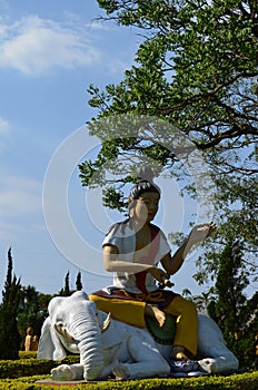 Statue in the buddhist temple of Iguassu Falls, Brazil. photo