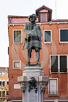 The statue of Carlo Goldoni on the Piazza Campo San Bartolomeo in Venice, Italy