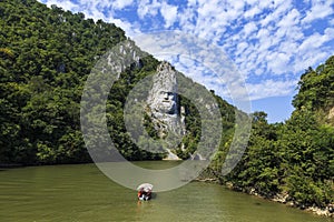 Statue carved in stone over river