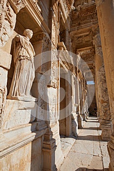 A statue in Celsus library in ancient city of Ephesus or Efes in Turkey. Antique ruins of roman city