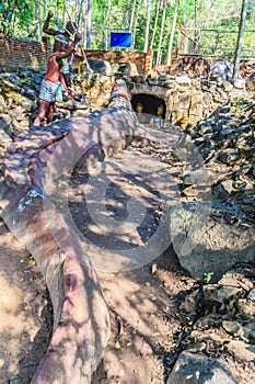 Statue of Chalawan and Kraithong at the front of the Chalawan cave (Chalawan is the king of crocodile in Thai literary), a deep ho