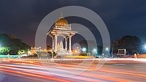 Statue of Chamarajendra Wadiyar illuminated in night time in Mysore city, India