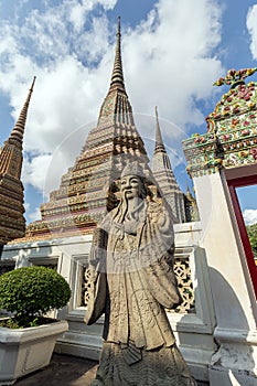 Statue and chedis at the Wat Pho temple in Bangkok