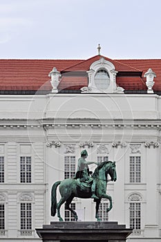 Statue of chevalier on a horse in Hofburg palace in Vienna, Austria photo