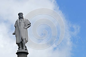 Statue of Christopher Colombus with blue sky