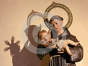Saint Anthony of Padua holding Baby Jesus photo