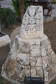 Statue in the city of Tulum. Tulum was one of the last cities built and inhabited by the Mayans.  Mexico