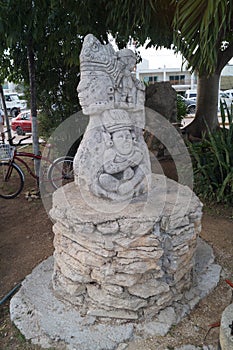 Statue in the city of Tulum. Tulum was one of the last cities built and inhabited by the Mayans.  Mexico photo