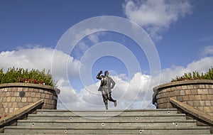 The statue of comedian Eric Morecambe on the promenade in Morecambe, Lancashire