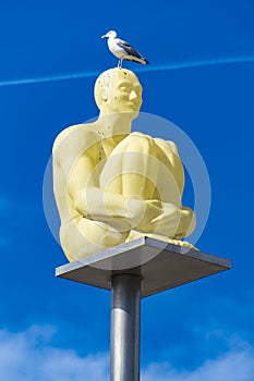 Statue from Conversation a Nice by Jaume Plensa on place Massena in Nice, France