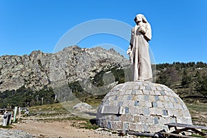 Statue of Crist Roi in Vergio Mountain pass in Corsica