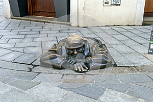 Statue of Cumil, the man at work in Bratislava