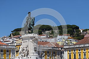 The statue of D. Jose at the Commerce Square Praca do Comercio with the Saint George Castle on the background, in the city of Li