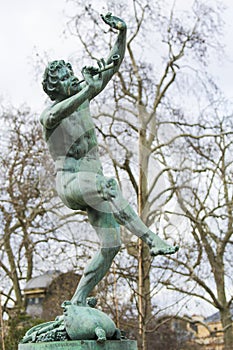 Statue of Dancing Faun in the Jardin de Luxembourg, Paris, France photo