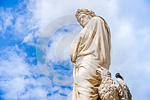 Statue of Dante Alighieri next to Basilica of Santa Croce, Florence, Italy