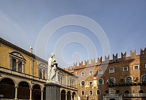 Statue of Dante Alighieri in Piazza dei Signori, Verona, Italy. Beautiful statues of Dante in the middle of Verona old town with