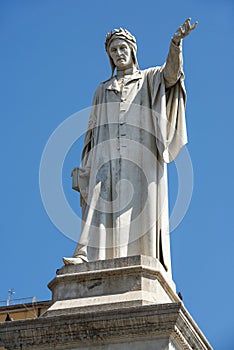 Statue of Dante Alighieri at Piazza Dante in Naples, Italy photo