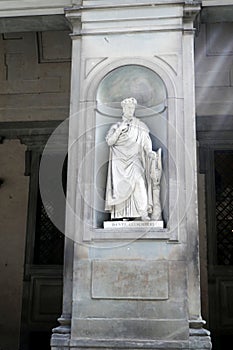 Statue of DANTE  ALLIGHIERI  in the niches of the Uffizi Gallery colonnade photo