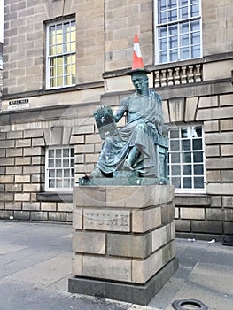 Statue of David Hume with traffic cone in Edinburgh,