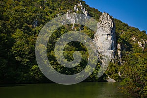 The statue of Decebal carved in the mountain. Decebal`s head carved in rock, Iron Gates Natural Park