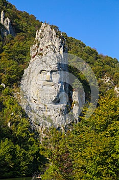 The statue of Decebal carved in the mountain. Decebal`s head carved in rock, Iron Gates Natural Park