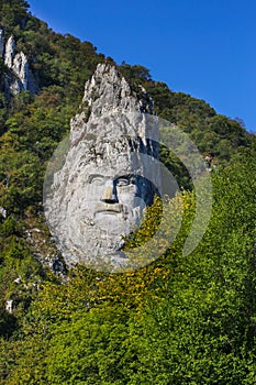 The statue of Decebal carved in the mountain. Decebal`s head carved in rock, Iron Gates Natural Park