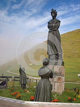 Statue depicting Our Lady of La Salette in a sanctuary in the Alps