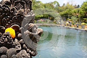 A statue detail in Tirta Gangga water palace. Karangasem Regency. Bali. Indonesia