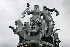 Statue Dionis and Ariadna chariot with four panthers on top of Dresden Opera Theatre in Dresden, Germany. May 2014 photo