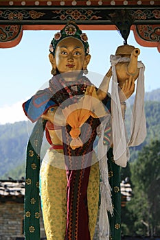 statue of a divinity (?) in a buddhist monument (national memorial chorten) in thimphu (bhutan)