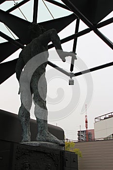 statue of a divinity in a buddhist temple (isshin-ji) in osaka (japan)