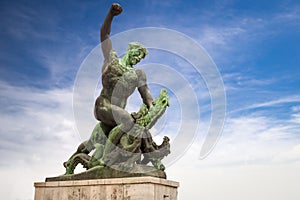 Statue of dragon slayer at the Citadel on Gellert hill in Budapest photo