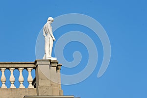 Statue on a facade of Ariana museum Geneva, Switzerland