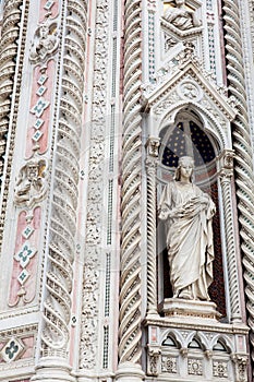 Statue on the facade of the Florence Cathedral formally called Cattedrale di Santa Maria del Fiore consecrated in 1436