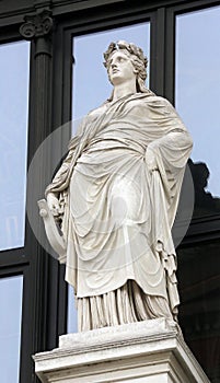 Statue on facade of Musikverein Vienna in Vienna