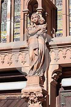 Statue on the facade of St. Nicholas Roman Catholic Cathedral constructed in the Gothic style. Kiev