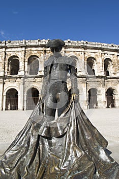 Statue of famous bullfighter in front of the arena in Nimes, France