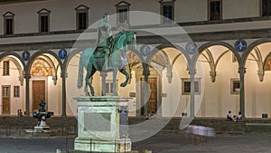 Statue of Ferdinando I de Medici timelapse in the Piazza della Santissima Annunziata in Florence, Italy photo