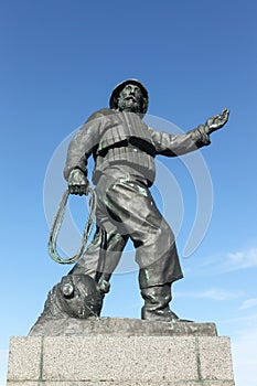 Statue of a fisherman at the harbour in Skagen