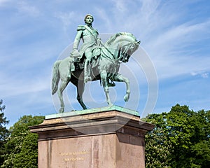 Statue of former Swedish and Norwegian King Karl XIV Johan sitting on a horse. photo