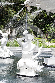 Statue in Fountain Spouting Water