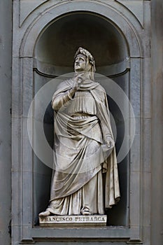 Statue of Francesco Petrarca, famous italian poet, Florence, Italy photo