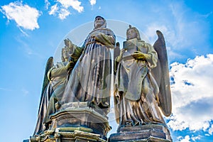 Statue of Francis of Assisi on Charles Bridge in Prague, Czech Republic