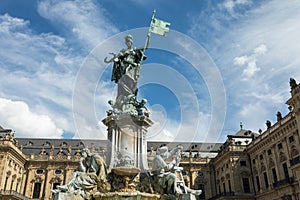 Statue of Frankonia in front of the Wuerzburg palace photo