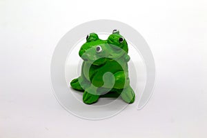 Statue of frog on a white background