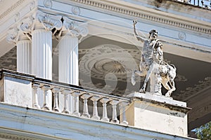 Statue in front of a Achillion palace