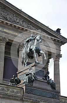 Statue front of Alte National Galerie from Berlin in Germany