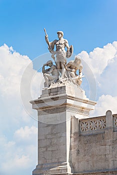 The statue in front of Monumento nazionale a Vittorio Emanuele I photo