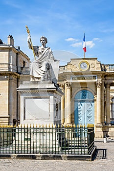 The statue in front of the Palais Bourbon which houses the French National Assembly in Paris, France